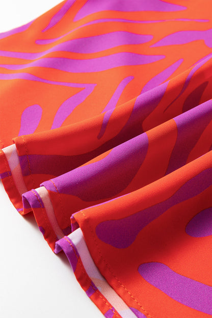 Abstract V-Neck Cuffed Short Sleeve Blouse