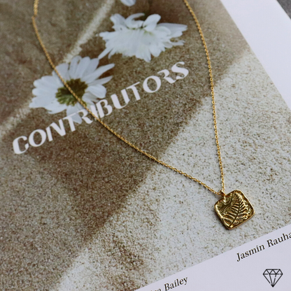 COLETTE CHARM NECKLACE